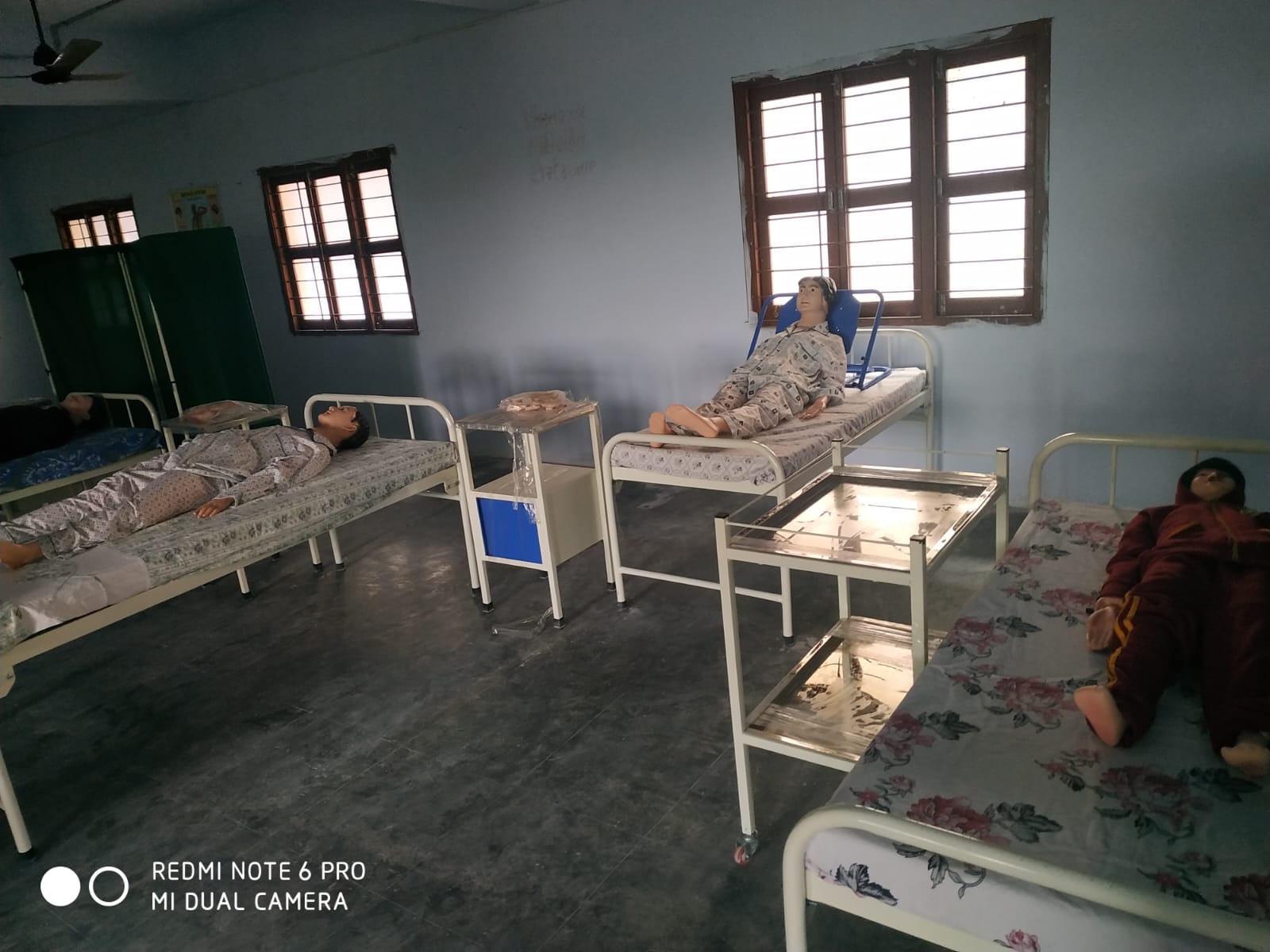 Close view of patient simulation manikins on training beds